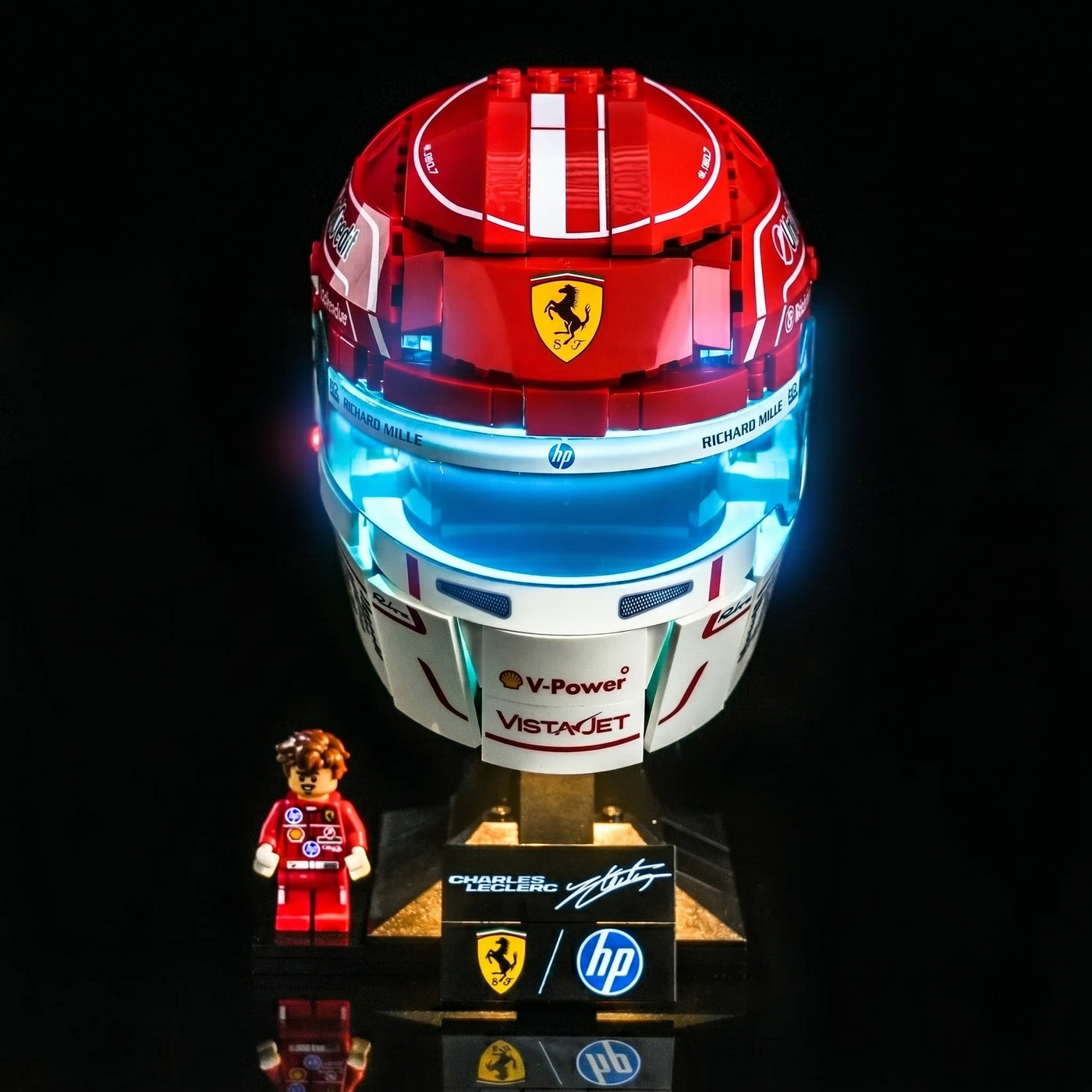 LEGO® Editions Scuderia Ferrari Charles Leclerc Helmet #43014 installed and glowing, with the DIY LED light kit