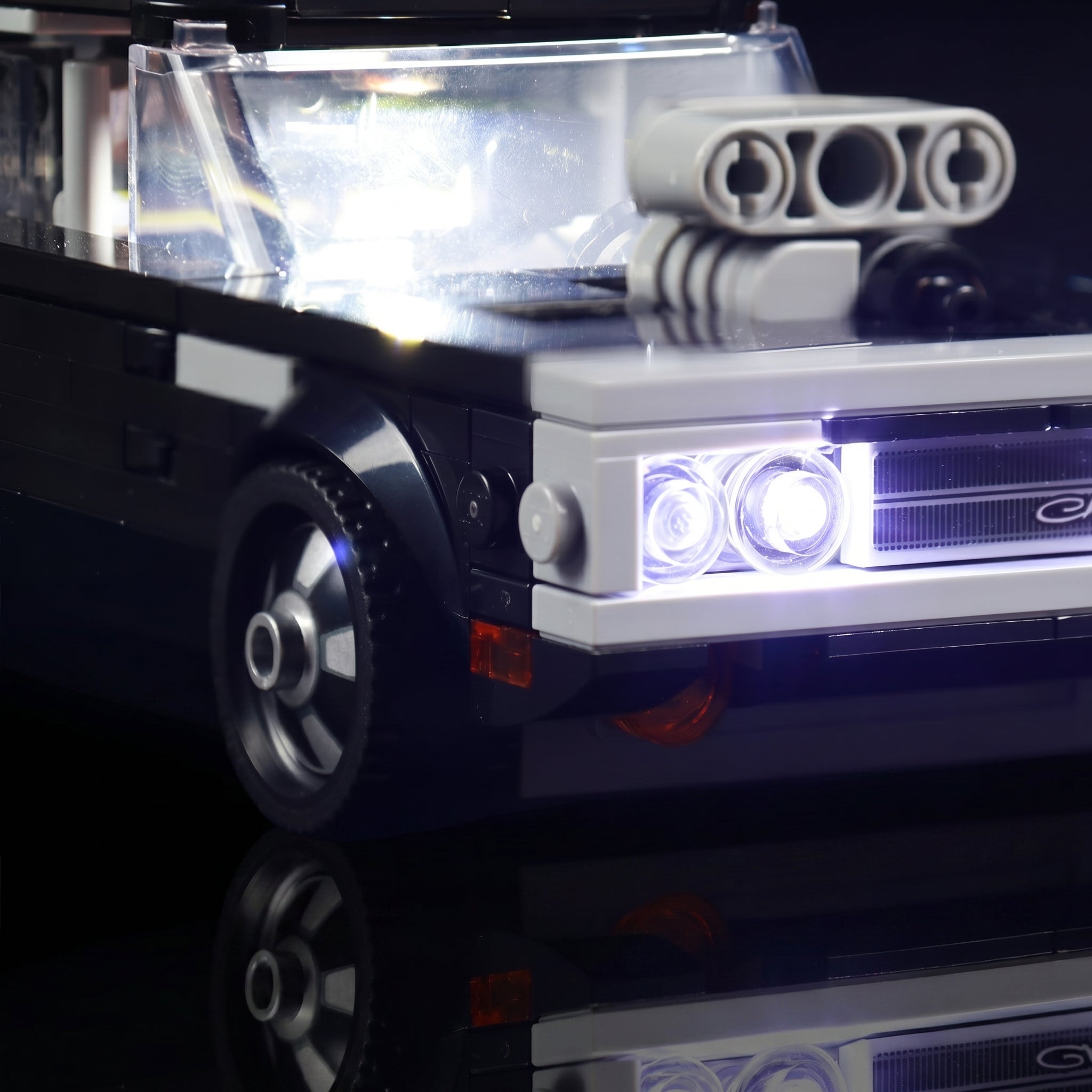 LEGO® Fast & Furious 1970 Dodge Charger R/T #76912 — installed and glowing (USB-powered LED light kit)