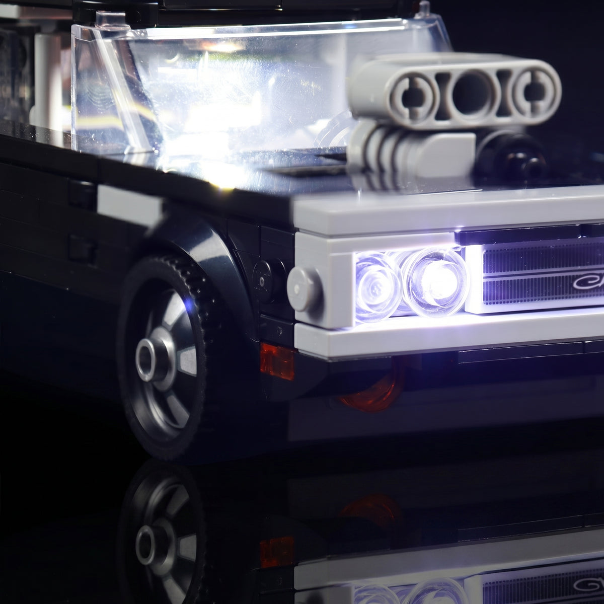 LEGO® Fast & Furious 1970 Dodge Charger R/T #76912 — installed and glowing (USB-powered LED light kit)