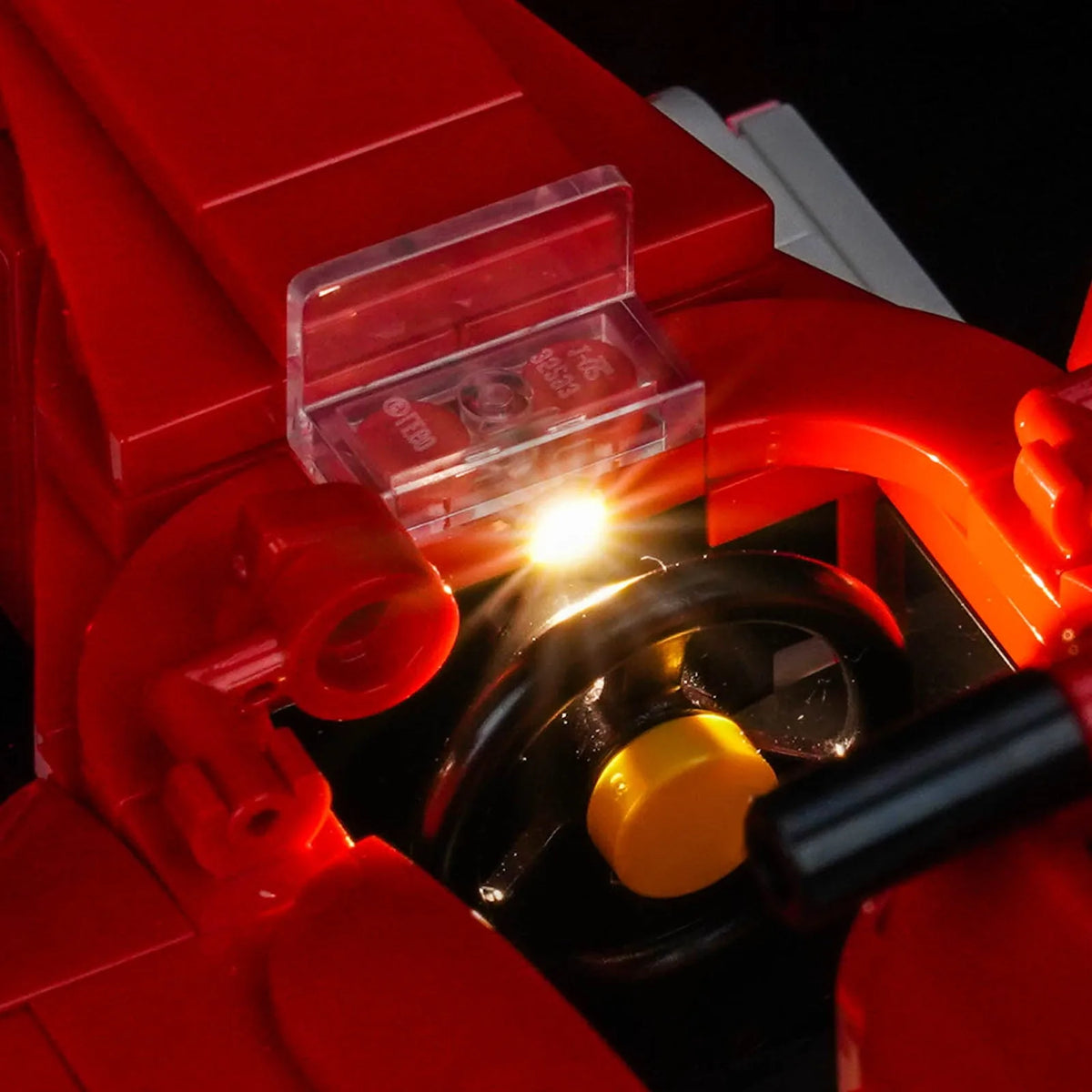 LEGO® Ferrari F2004 & Michael Schumacher #11375 front view fully lit, with the LED light kit