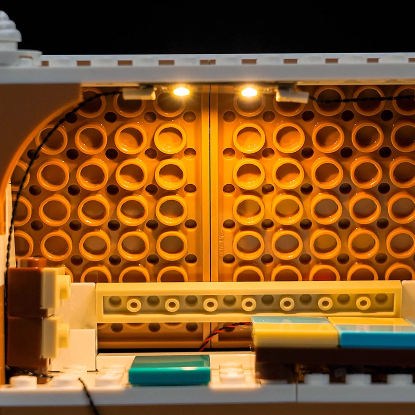 LEGO® Festive Gingerbread House #40809 LED strips and bricks detail, with the LED lights