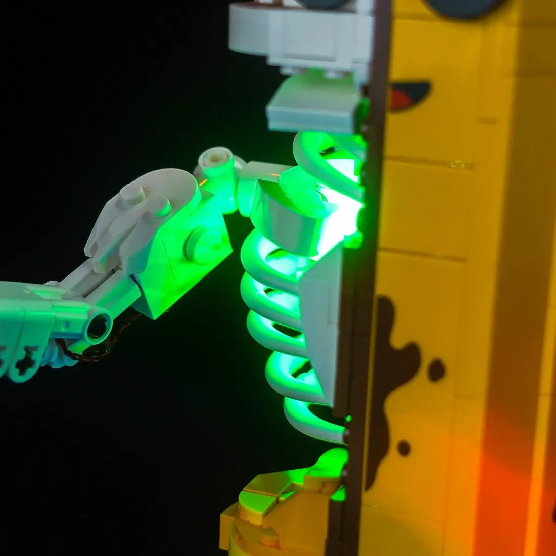 side angle with lights on: Bright My Bricks premium LED light kit for LEGO® Fortnite Peely Bone #77072