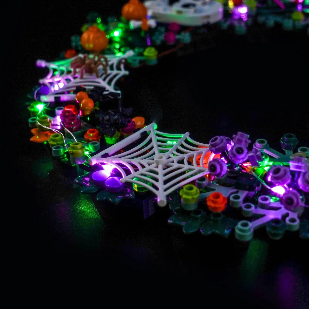 LEGO® Halloween Wreath #40825 installed and glowing, with the LED lights