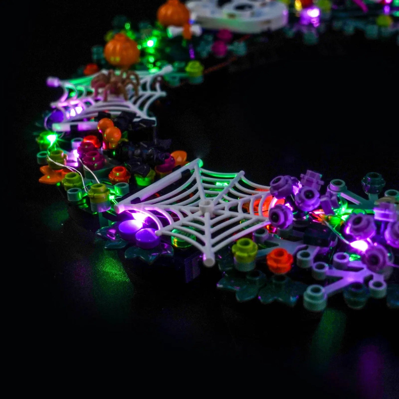 LEGO® Halloween Wreath #40825 installed and glowing, with the LED lights