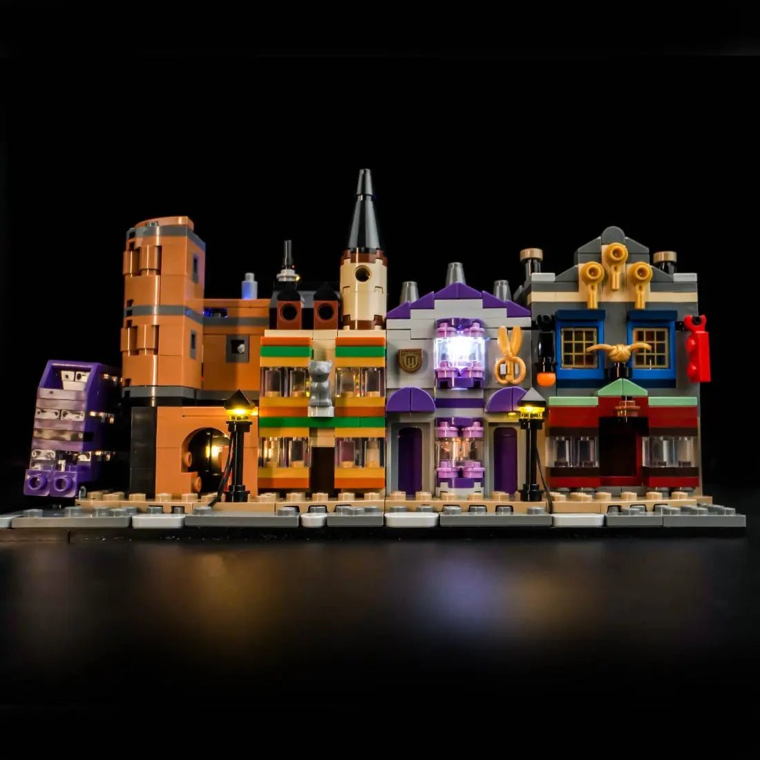 LEGO Harry Potter Diagon Alley: Wizarding Shops #76444 lit up - front angle