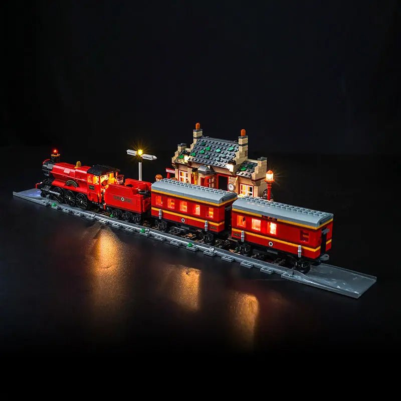 LEGO Harry Potter Hogwarts Express & Hogsmeade Station #76423 illuminated at night