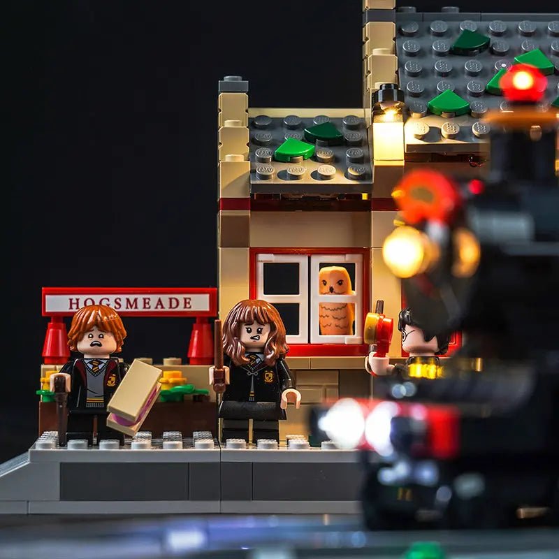 LEGO® Harry Potter Hogwarts Express & Hogsmeade Station #76423 illuminated at night, with the USB-powered LED light kit
