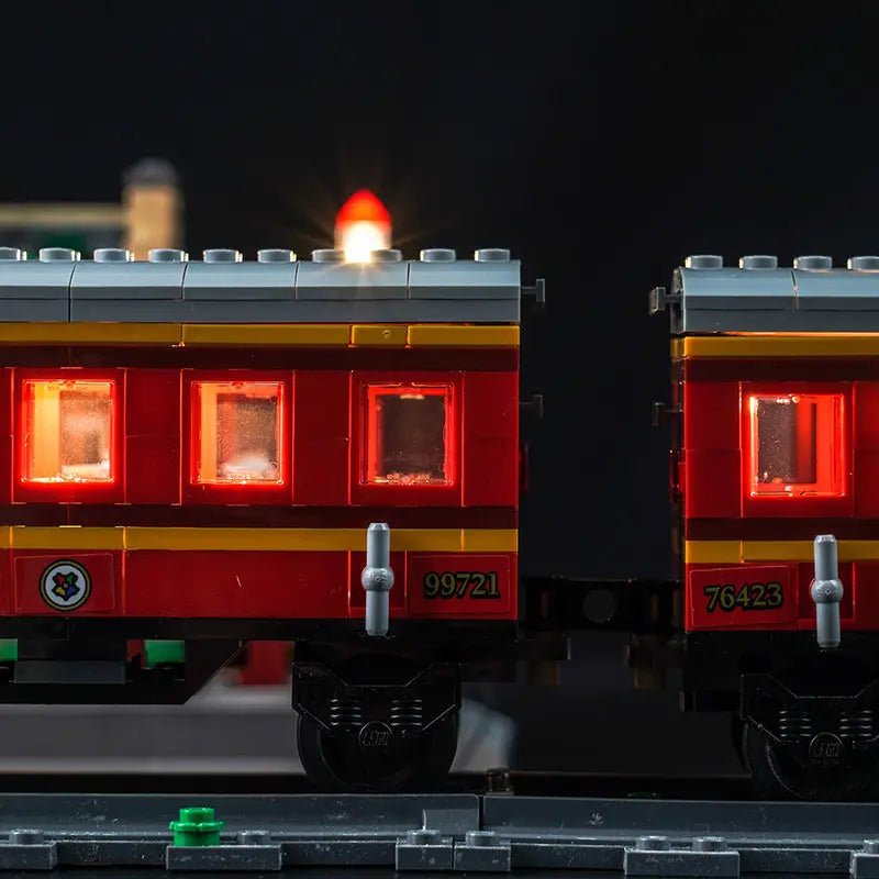 LEGO® Harry Potter Hogwarts Express & Hogsmeade Station #76423 — illuminated at night (LED lights)