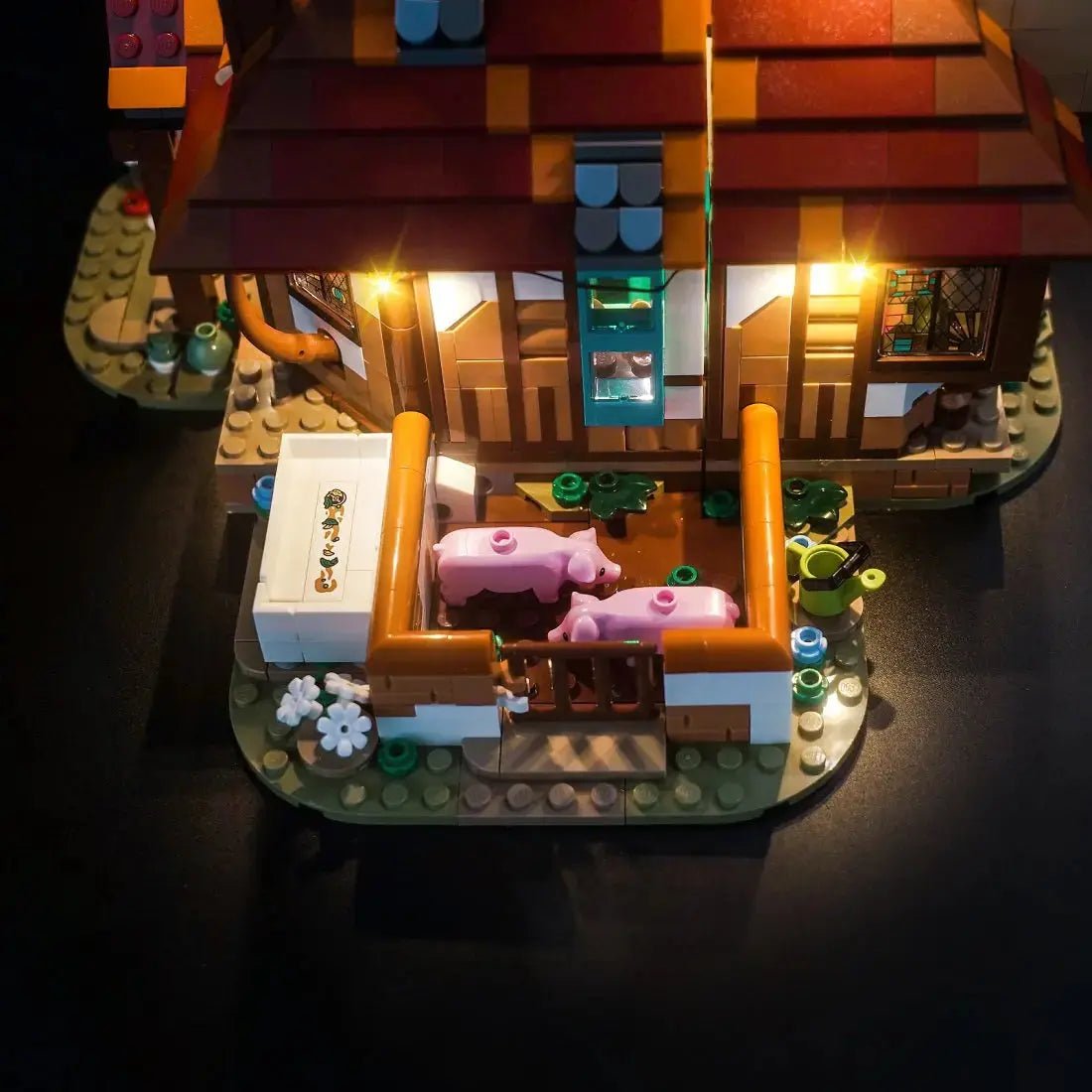 LEGO Harry Potter The Burrow #76437 lit up - front angle