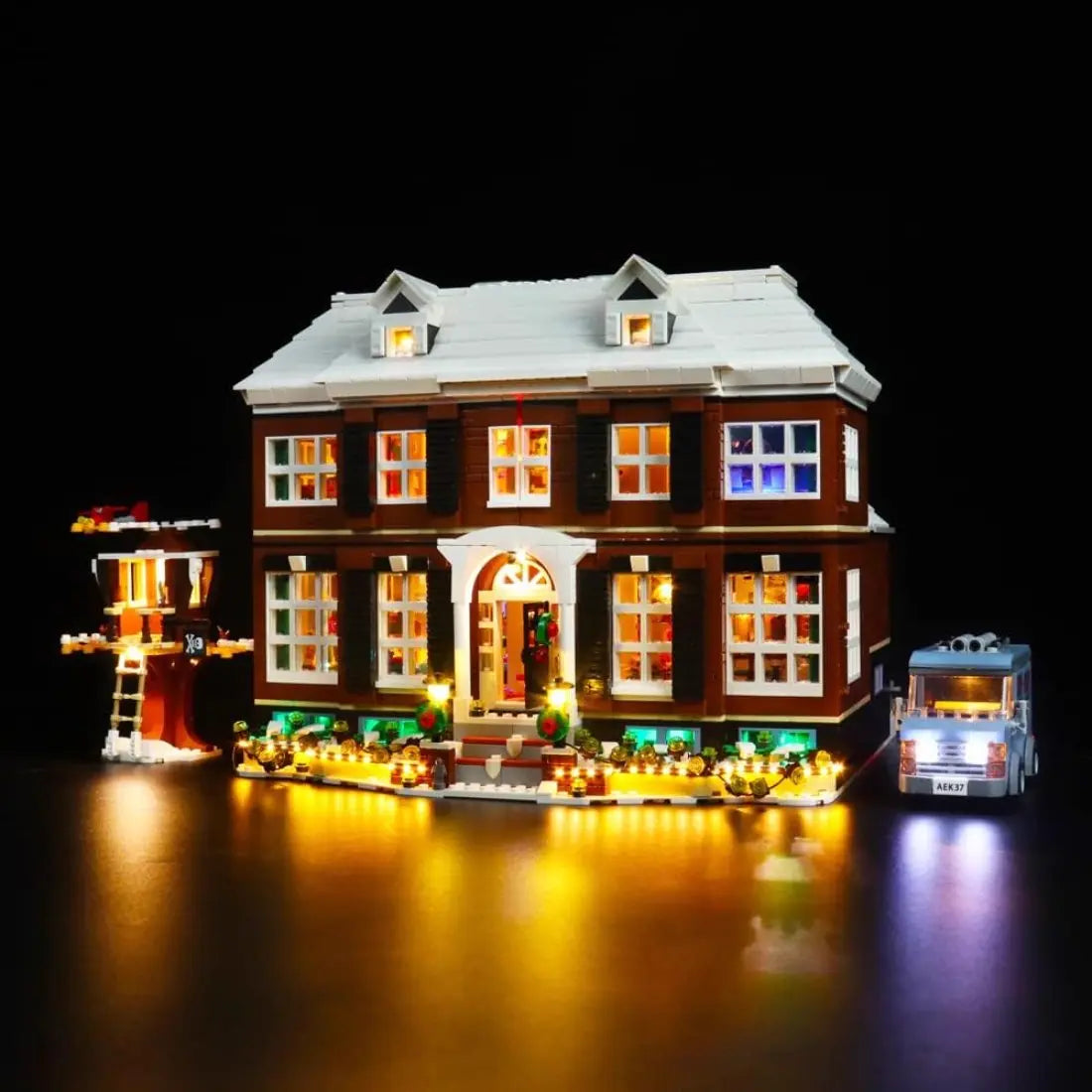 LEGO Home Alone #21330 illuminated at night