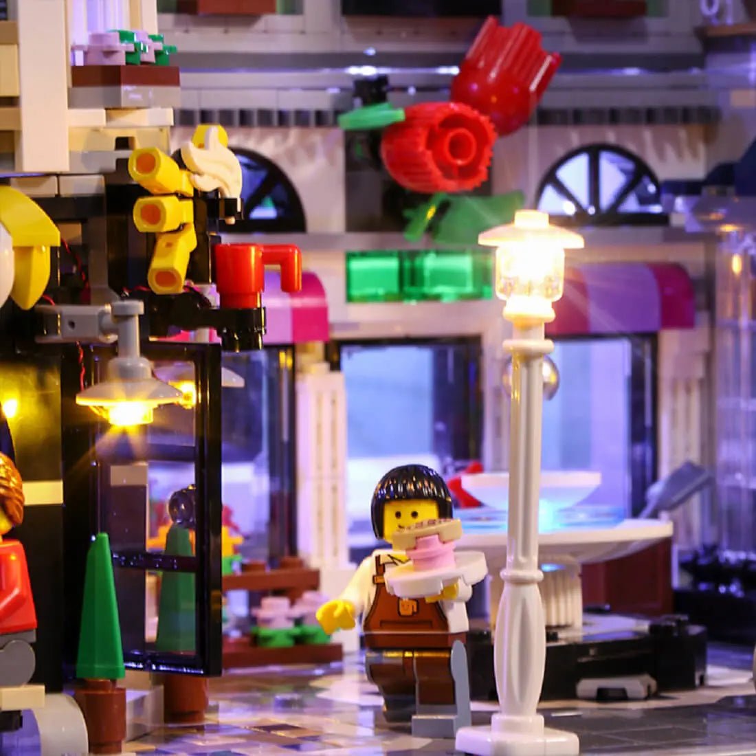 LEGO® Icons Assembly Square #10255 — brightened interior detail (LED lights)