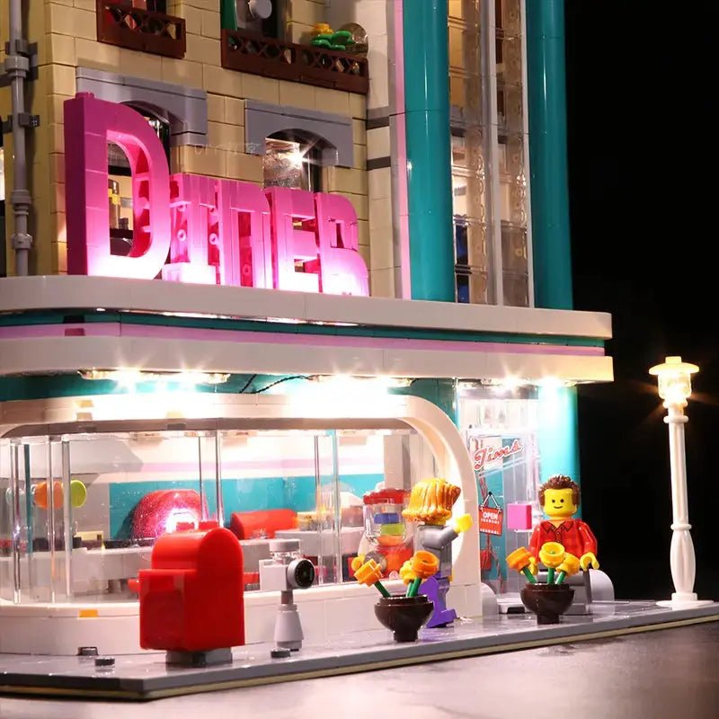 LEGO Icons Downtown Diner #10260 illuminated at night