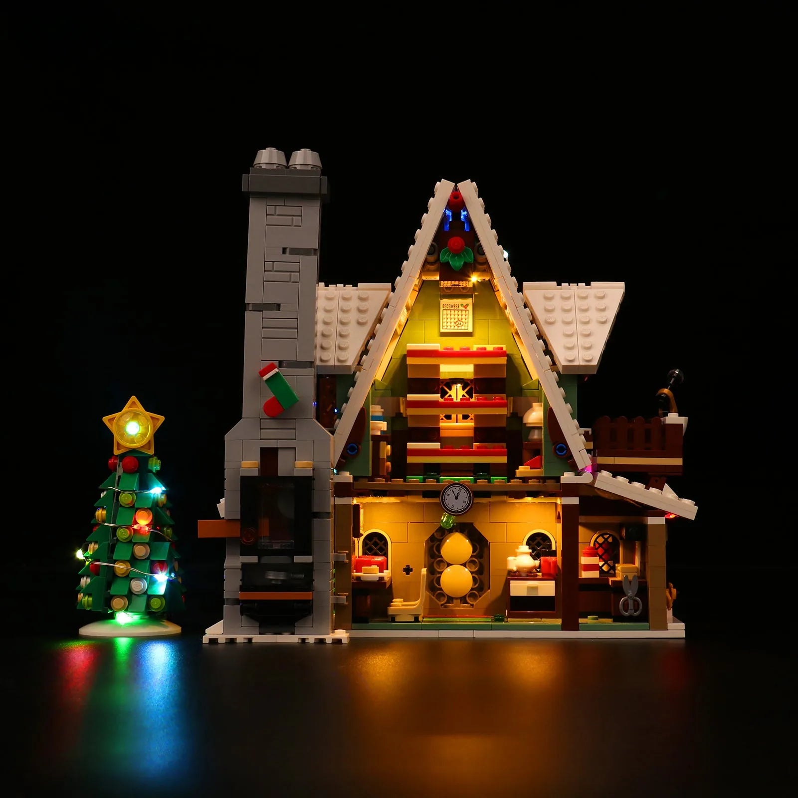 LEGO® Icons Elf Club House #10275 illuminated at night, with the USB-powered LED light kit