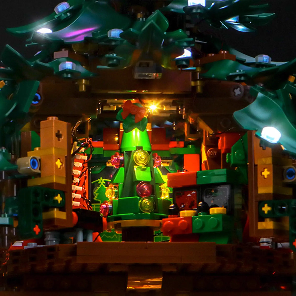 LED light kit for LEGO® Icons Family Christmas Tree #41843, illuminated at night