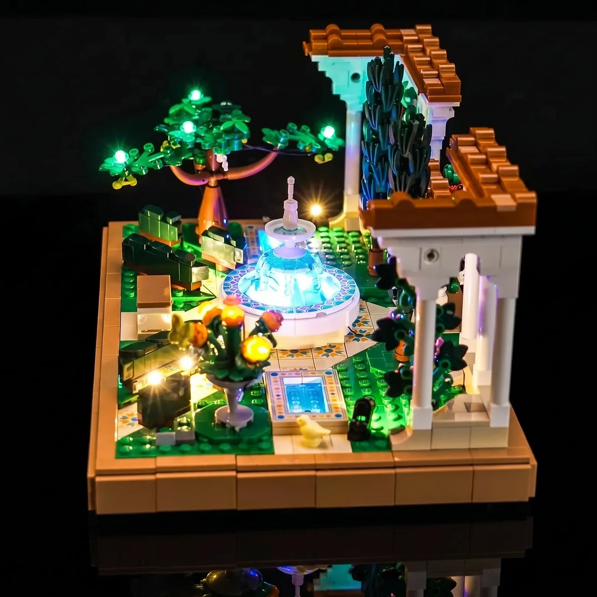 LEGO® Icons Fountain Garden #10359 — display lighting in a dark room (light kit)