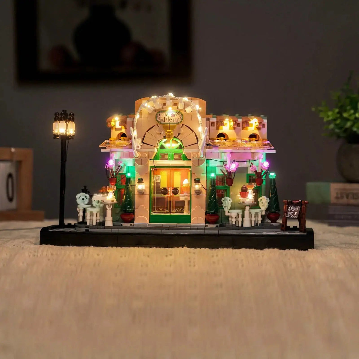 LEGO® Icons French Café #10362 display lighting in a dark room, with the display light kit