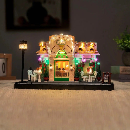 LEGO® Icons French Café #10362 display lighting in a dark room, with the display light kit