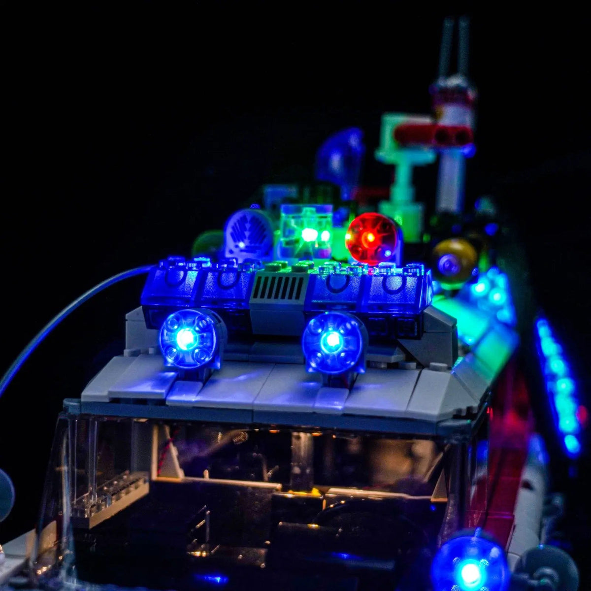 LEGO® Icons Ghostbusters ECTO-1 #10274 — before-and-after lighting (RGB LED light kit)