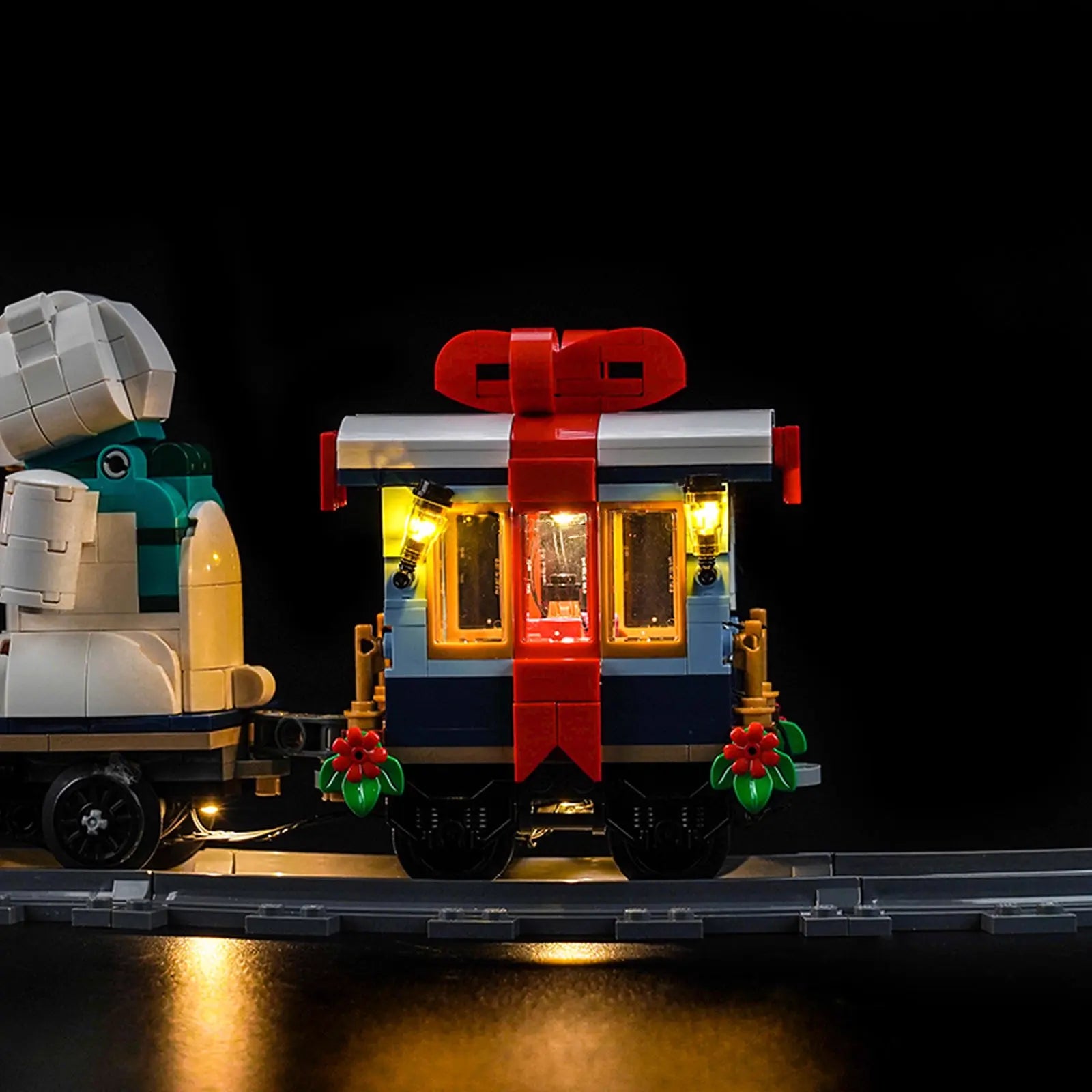 LEGO Icons Holiday Express Train #10361 lit up - front angle