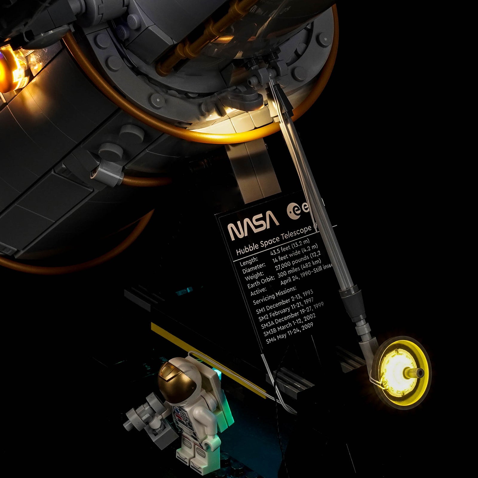 LEGO® Icons Hubble Space Telescope #11382 display lighting in a dark room, with the premium LED light kit