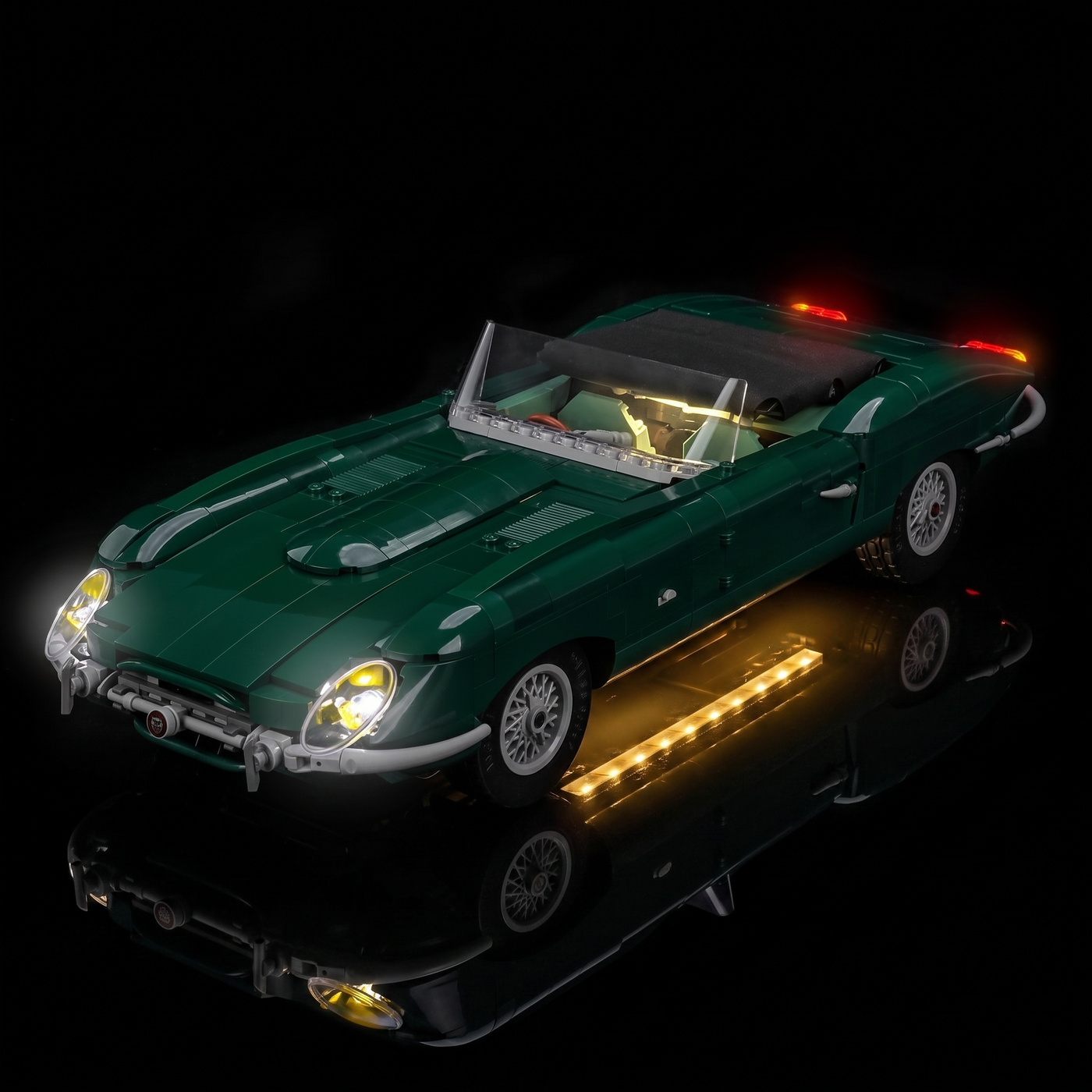 LEGO® Icons Jaguar E-Type #11381 display lighting in a dark room, with the premium LED light kit