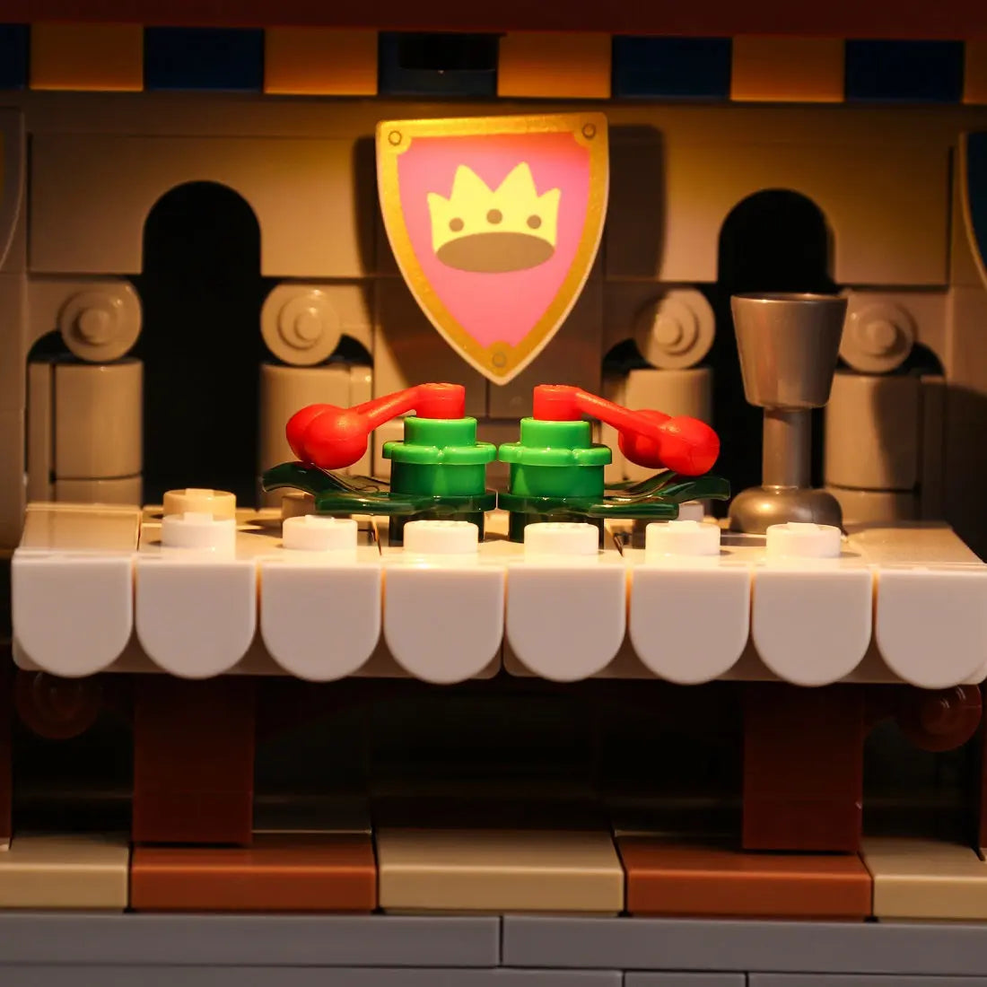 LEGO® Icons Lion Knights' Castle #10305 brightened interior detail, with the USB-powered LED light kit