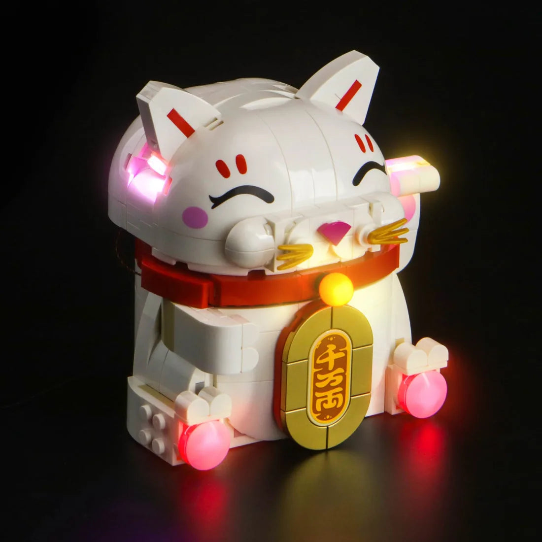 LEGO® Icons Lucky Cat #40813 side angle with lights on, with the custom LED lighting