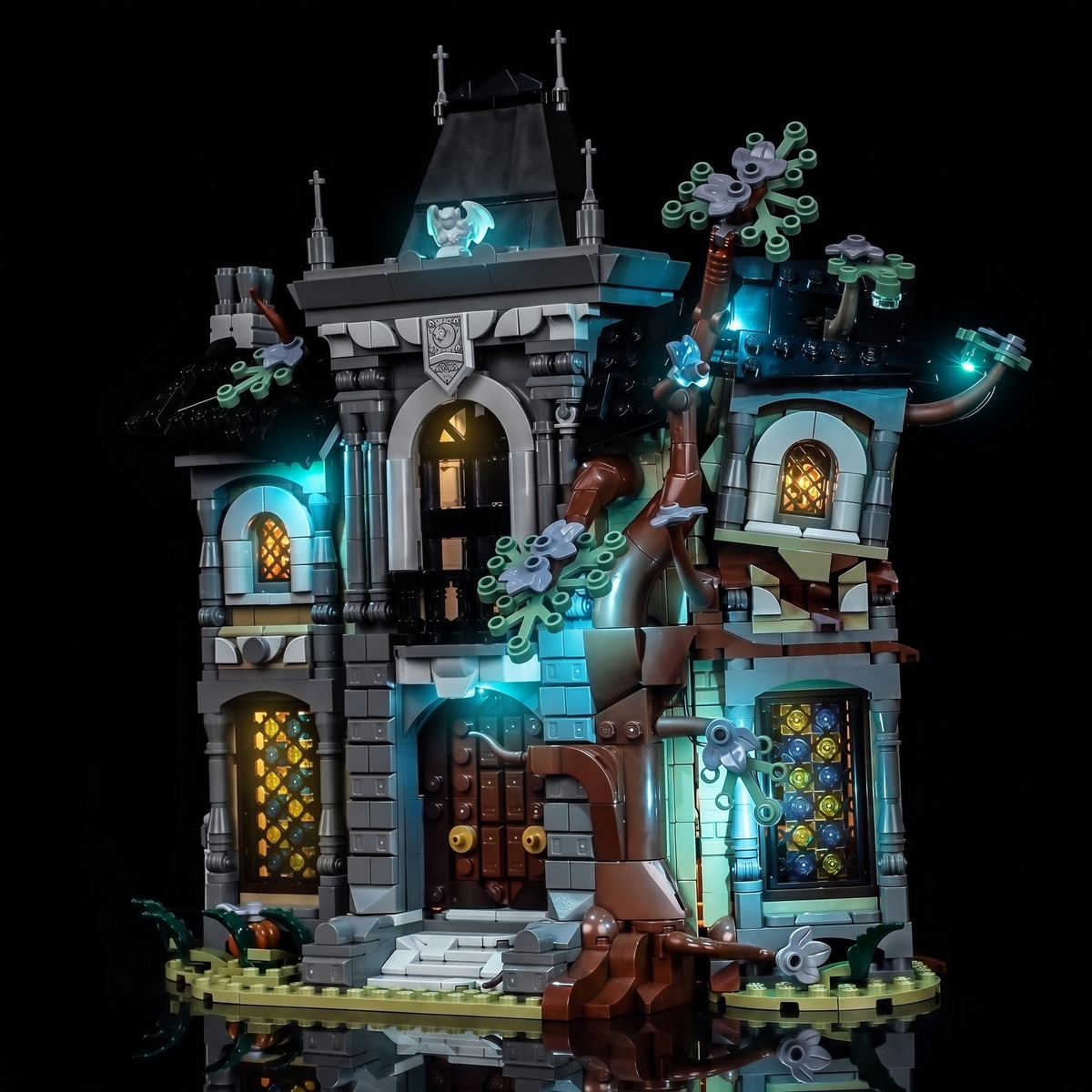 LEGO® Icons Mayor Manor #11383 cold cyan behind the facade, with the USB-powered LED light kit