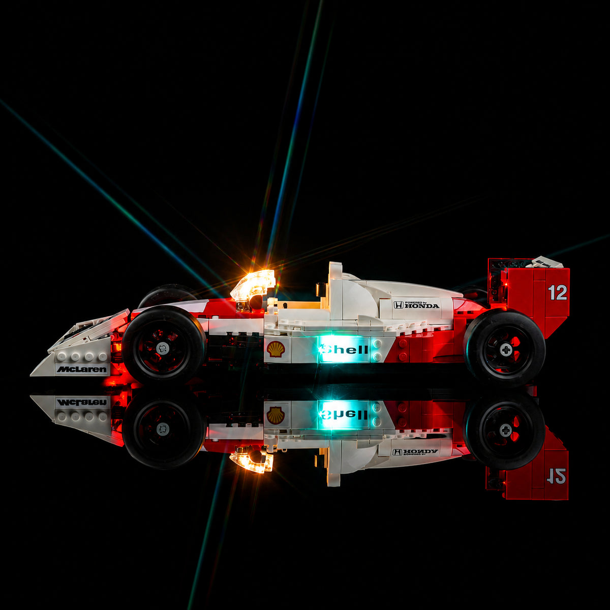 Bright My Bricks USB-powered LED light kit for LEGO® Icons McLaren MP4/4 & Ayrton Senna #10330 — illuminated at night