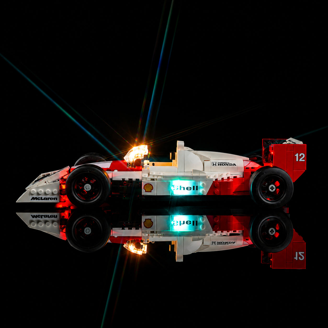 Bright My Bricks USB-powered LED light kit for LEGO® Icons McLaren MP4/4 & Ayrton Senna #10330 — illuminated at night