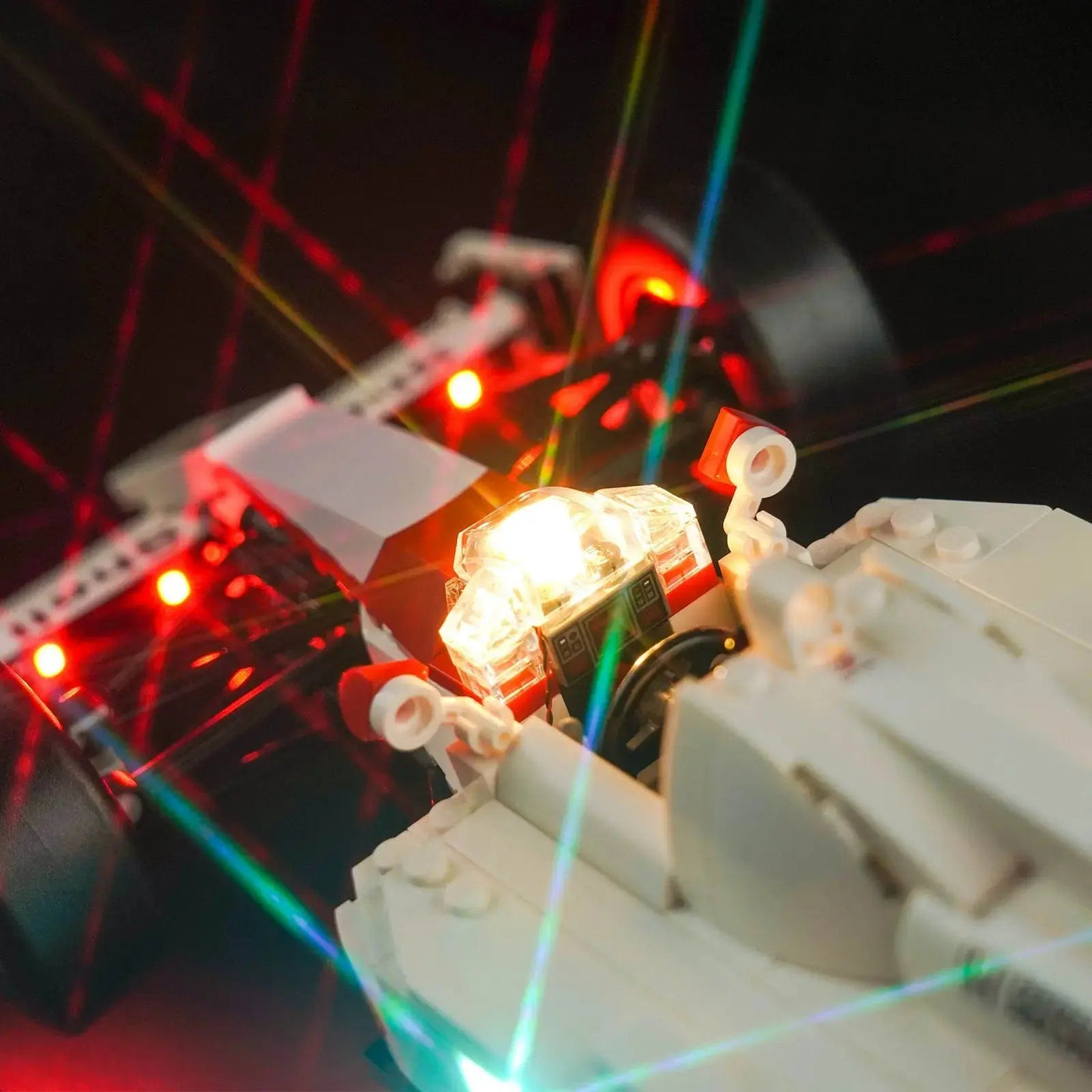 LEGO® Icons McLaren MP4/4 & Ayrton Senna #10330 installed and glowing, with the premium LED light kit