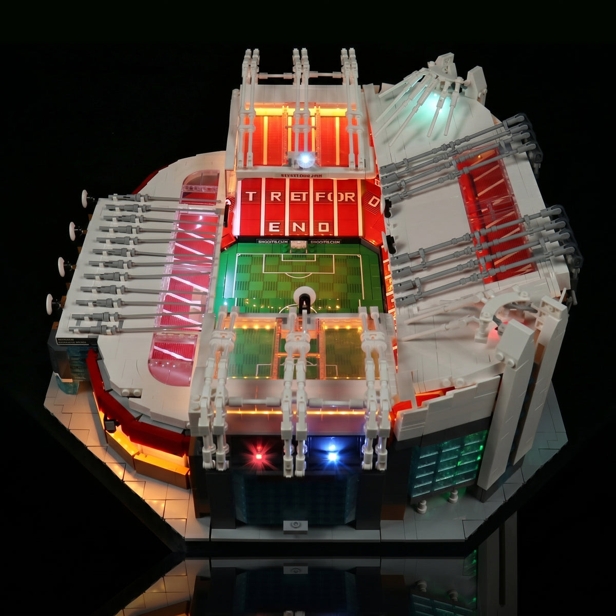LEGO® Icons Old Trafford #10272 fully illuminated on display, with the USB-powered LED light kit