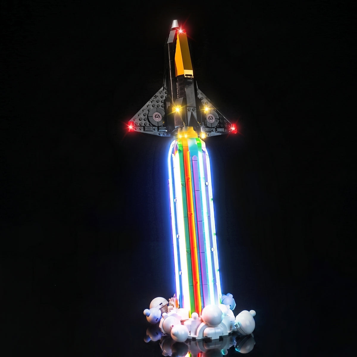 LEGO® Icons Over the Moon with Pharrell Williams #10391 installed and glowing, with the LED lighting kit