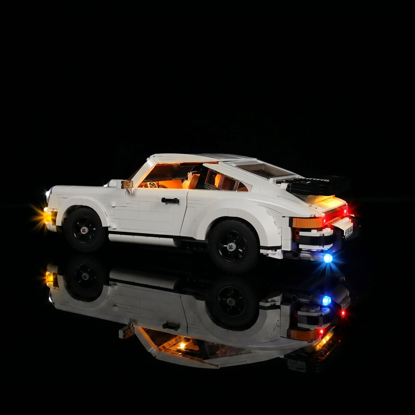 LEGO® Icons Porsche 911 #10295 front view fully lit, with the RGB LED light kit
