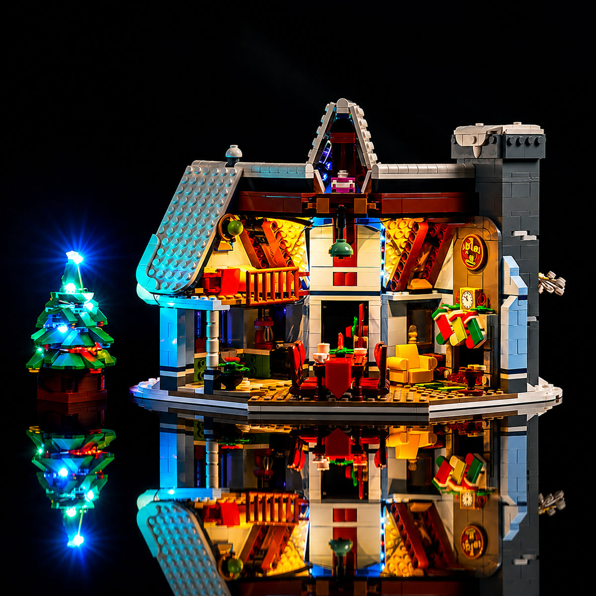 LEGO® Icons Santa’s Visit #10293 side angle with lights on, with the LED light kit