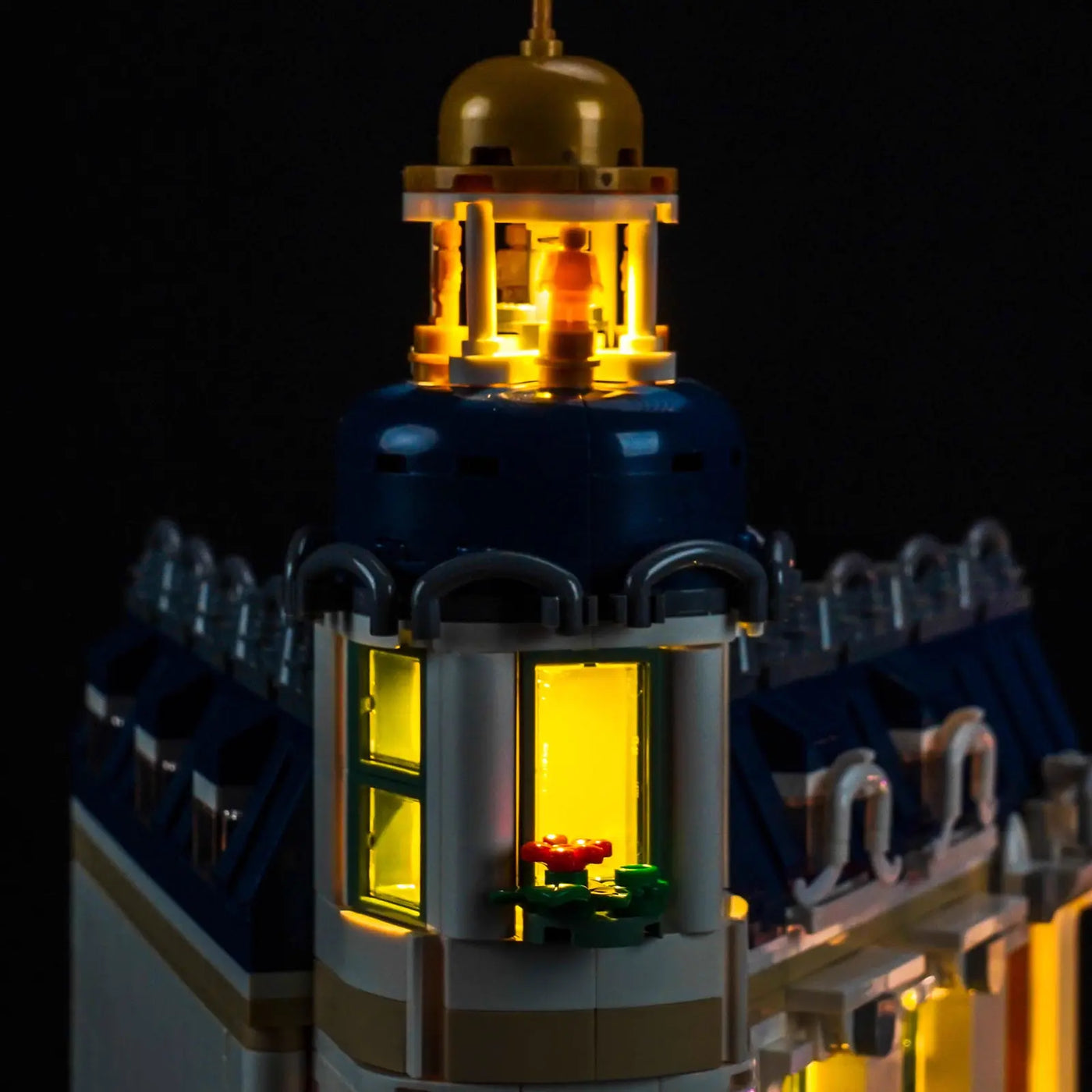 LEGO® Icons Shopping Street #11371 warm LED glow detail, with the LED lights