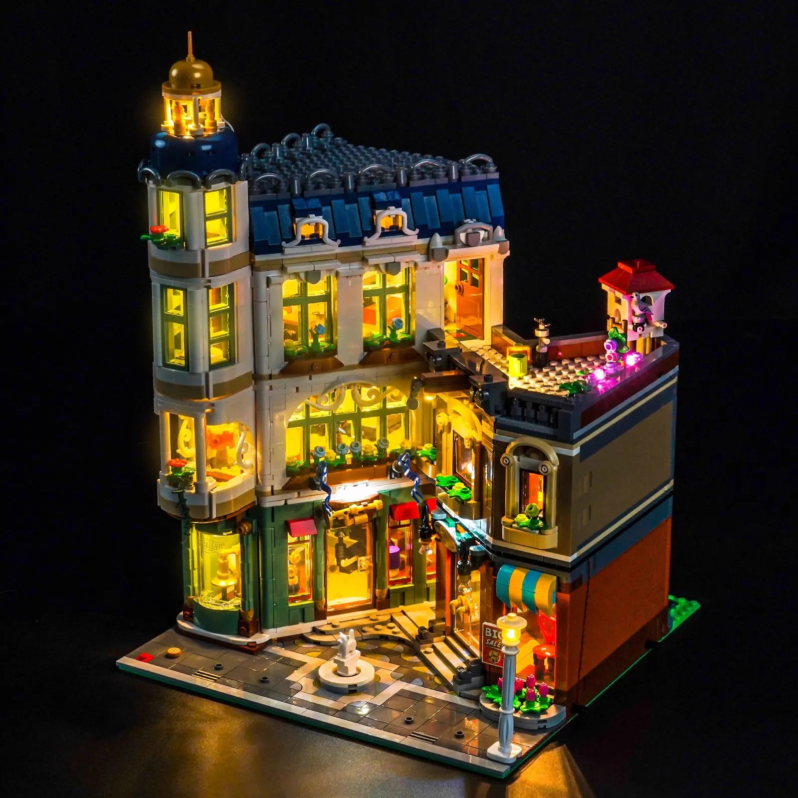 LEGO Icons Shopping Street #11371 illuminated at night
