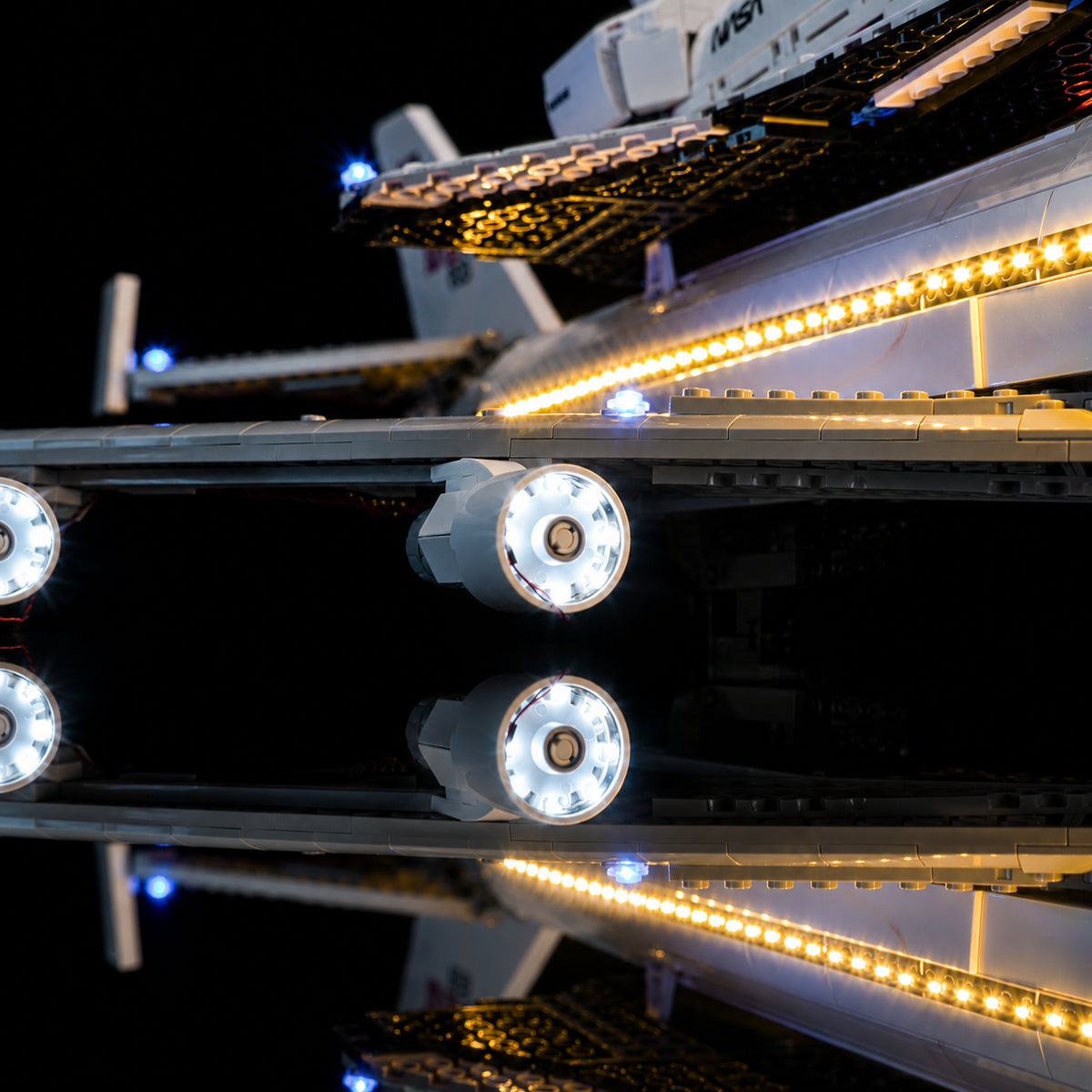 LEGO® Icons Shuttle Carrier Aircraft #10360 illuminated at night, with the premium LED light kit