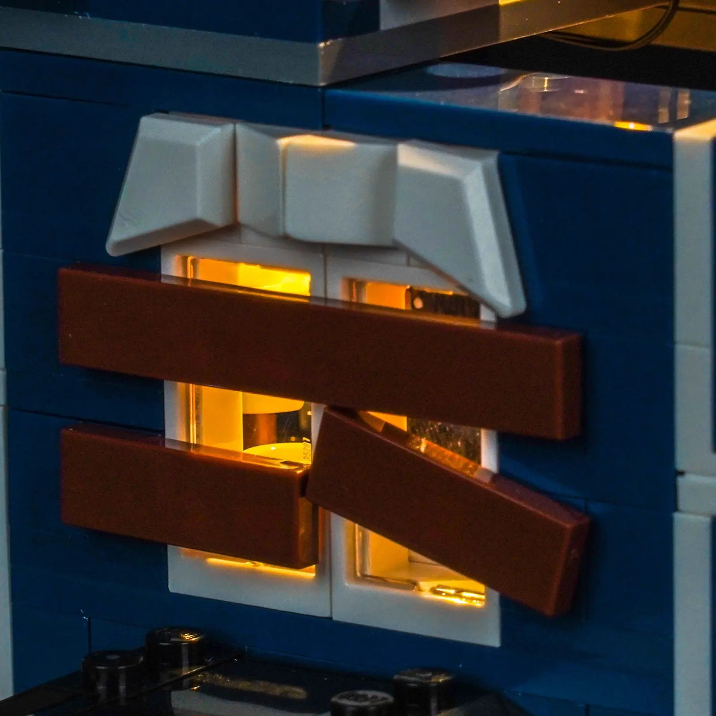 USB-powered LED light kit for LEGO® Icons Stranger Things: The Creel House #11370, illuminated at night