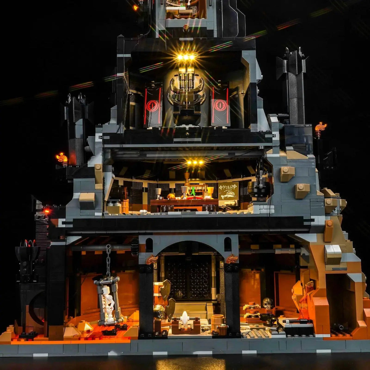 LEGO® Icons The Lord of the Rings: Barad-dûr #10333 illuminated at night, with the premium LED light kit