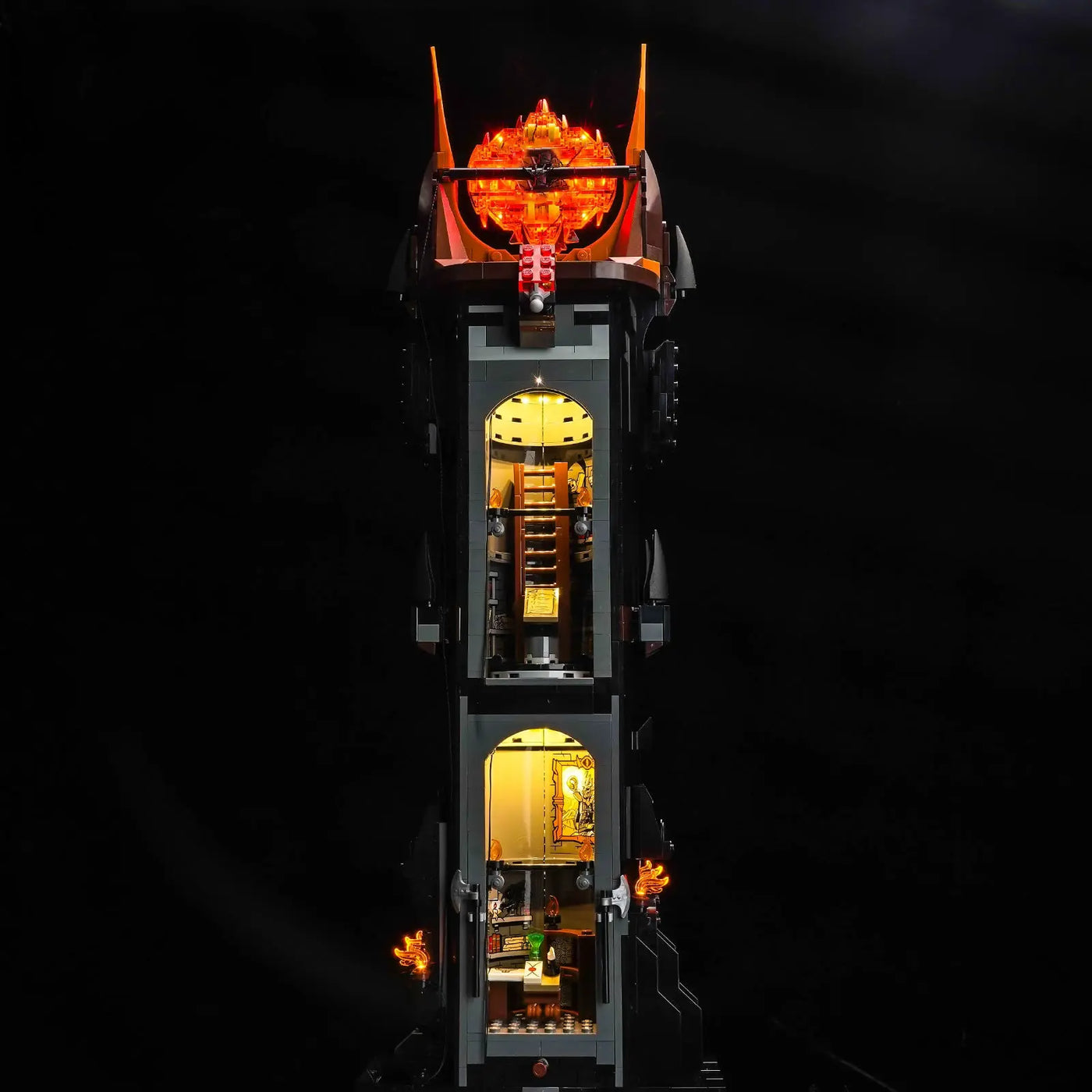 LEGO® Icons The Lord of the Rings: Barad-dûr #10333 illuminated at night, with the premium LED light kit