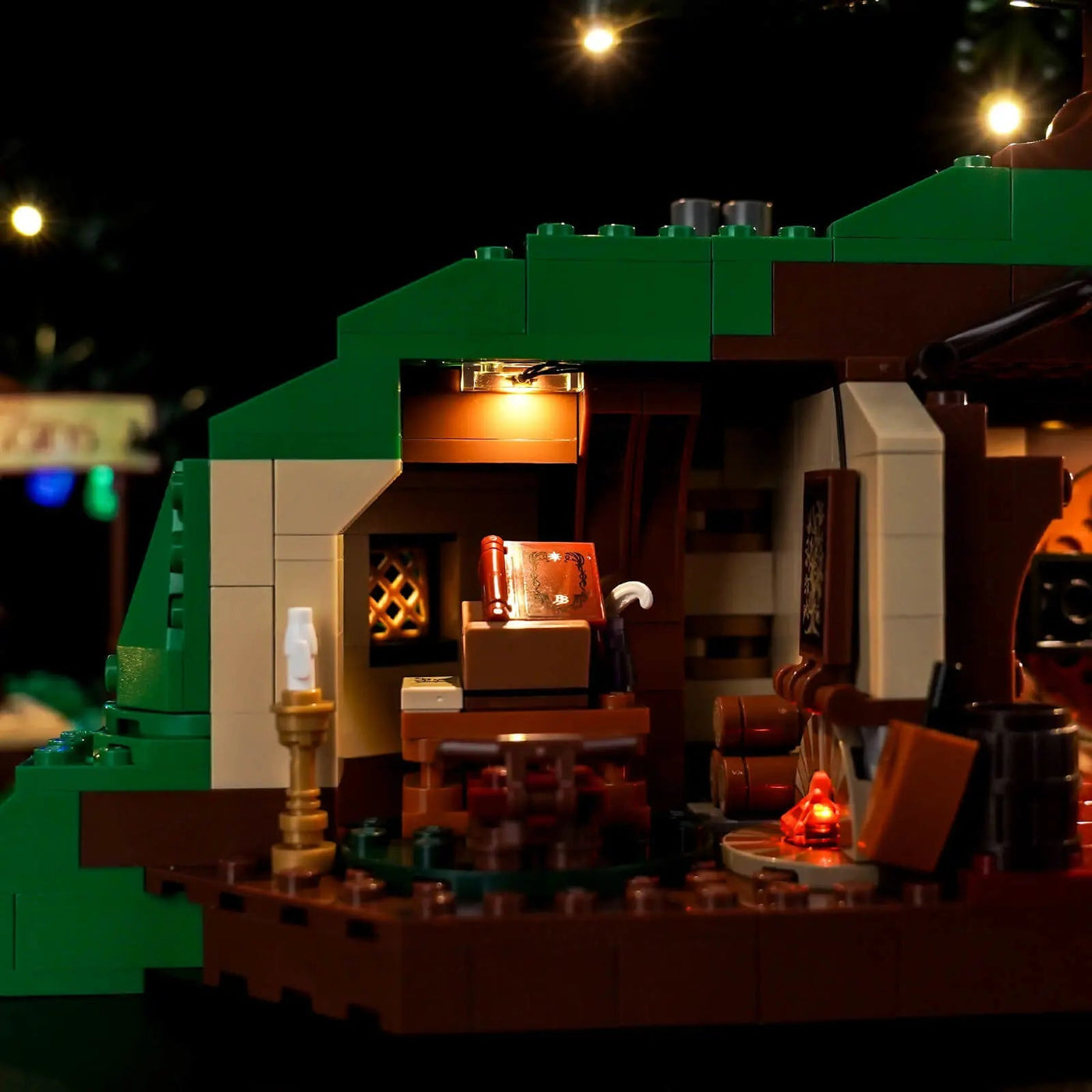 LEGO® Icons The Lord of the Rings: The Shire #10354 showcase lighting view, with the LED lights