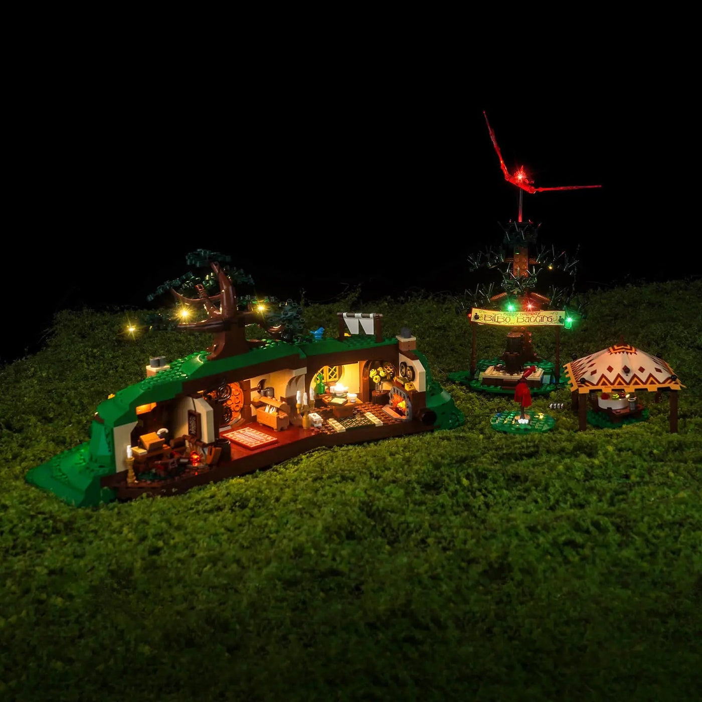 LEGO® Icons The Lord of the Rings: The Shire #10354 front view fully lit, with the LED lights