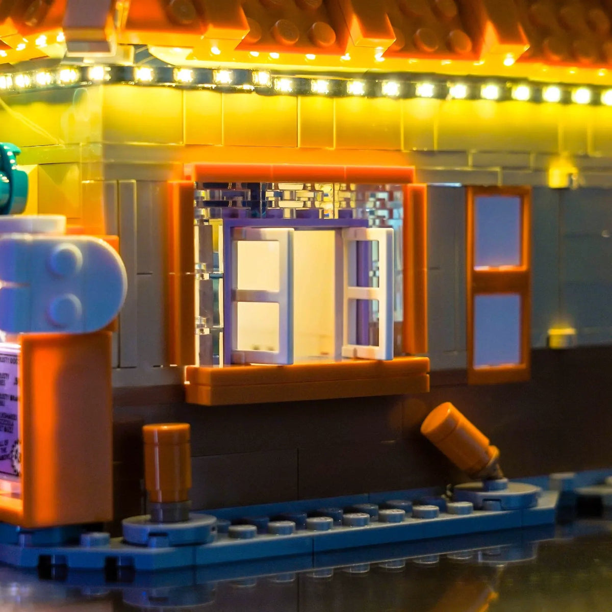 LEGO® Icons The Simpsons: Krusty Burger #10352 warm LED glow detail, with the LED lights