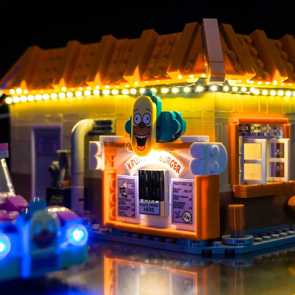 LEGO® Icons The Simpsons: Krusty Burger #10352 — side angle with lights on (LED light kit)