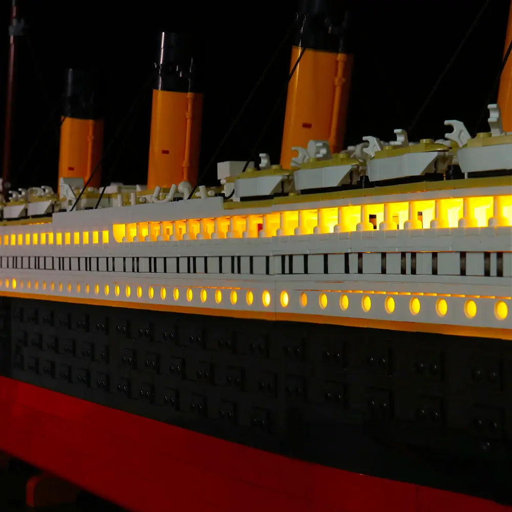 LEGO® Icons Titanic #10294 fully illuminated on display, with the light kit