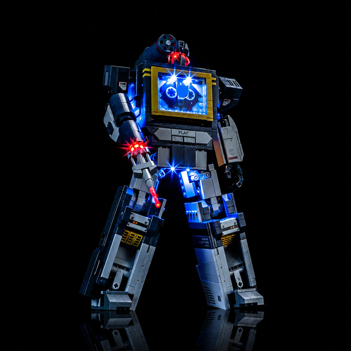 LEGO® Icons Transformers: Soundwave #10358 illuminated at night, with the light kit