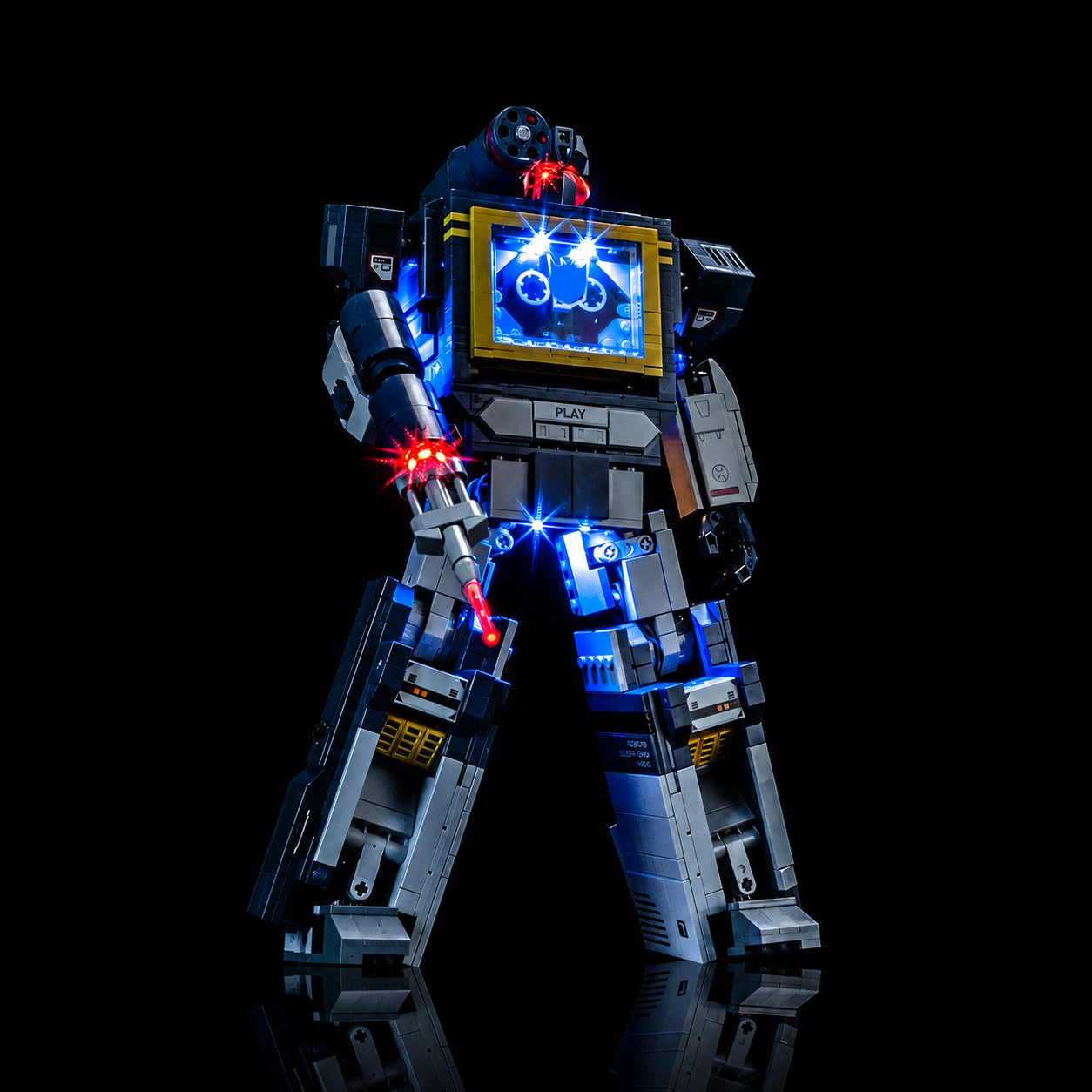 LEGO® Icons Transformers: Soundwave #10358 illuminated at night, with the light kit