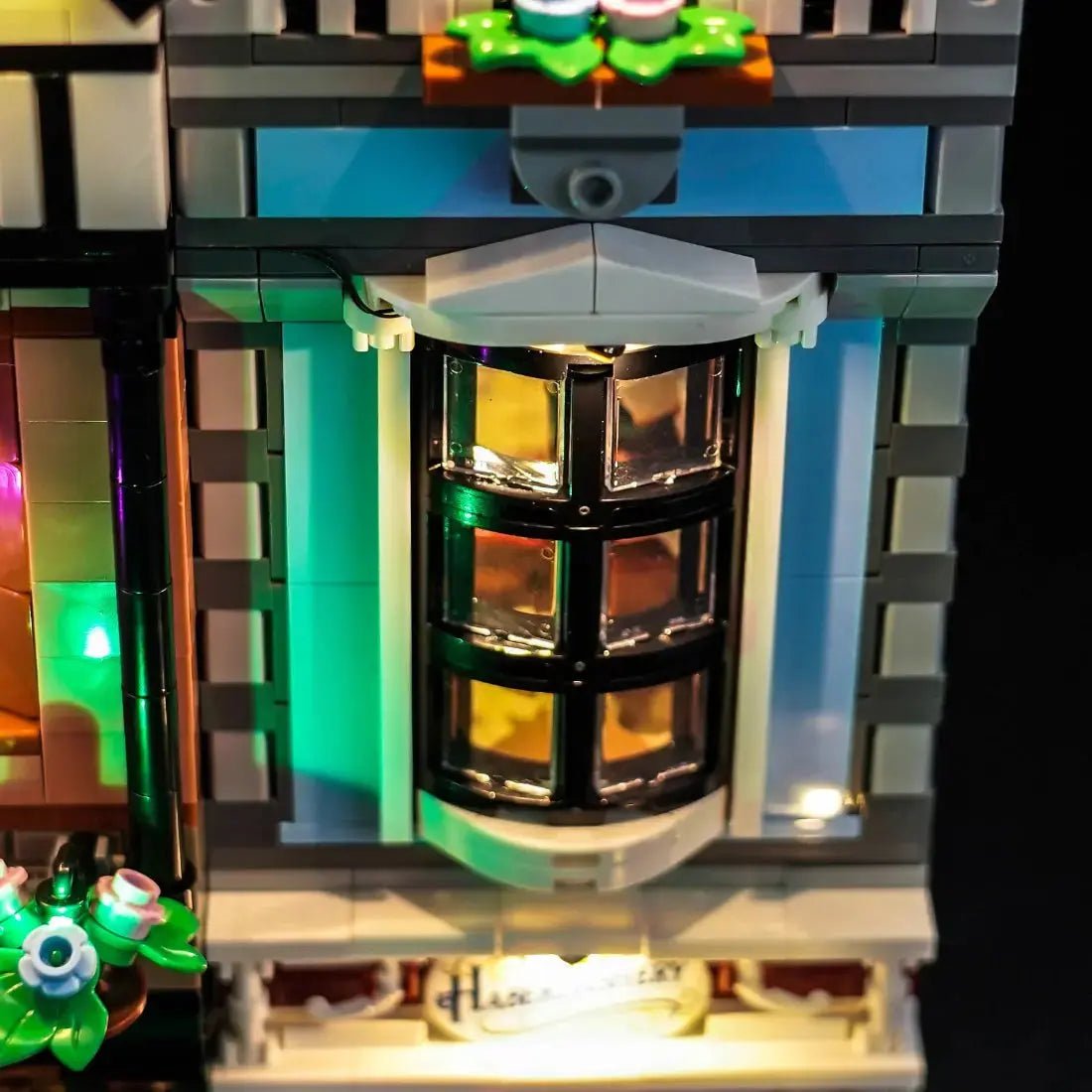 LED lighting kit for LEGO® Icons Tudor Corner #10350, side angle with lights on