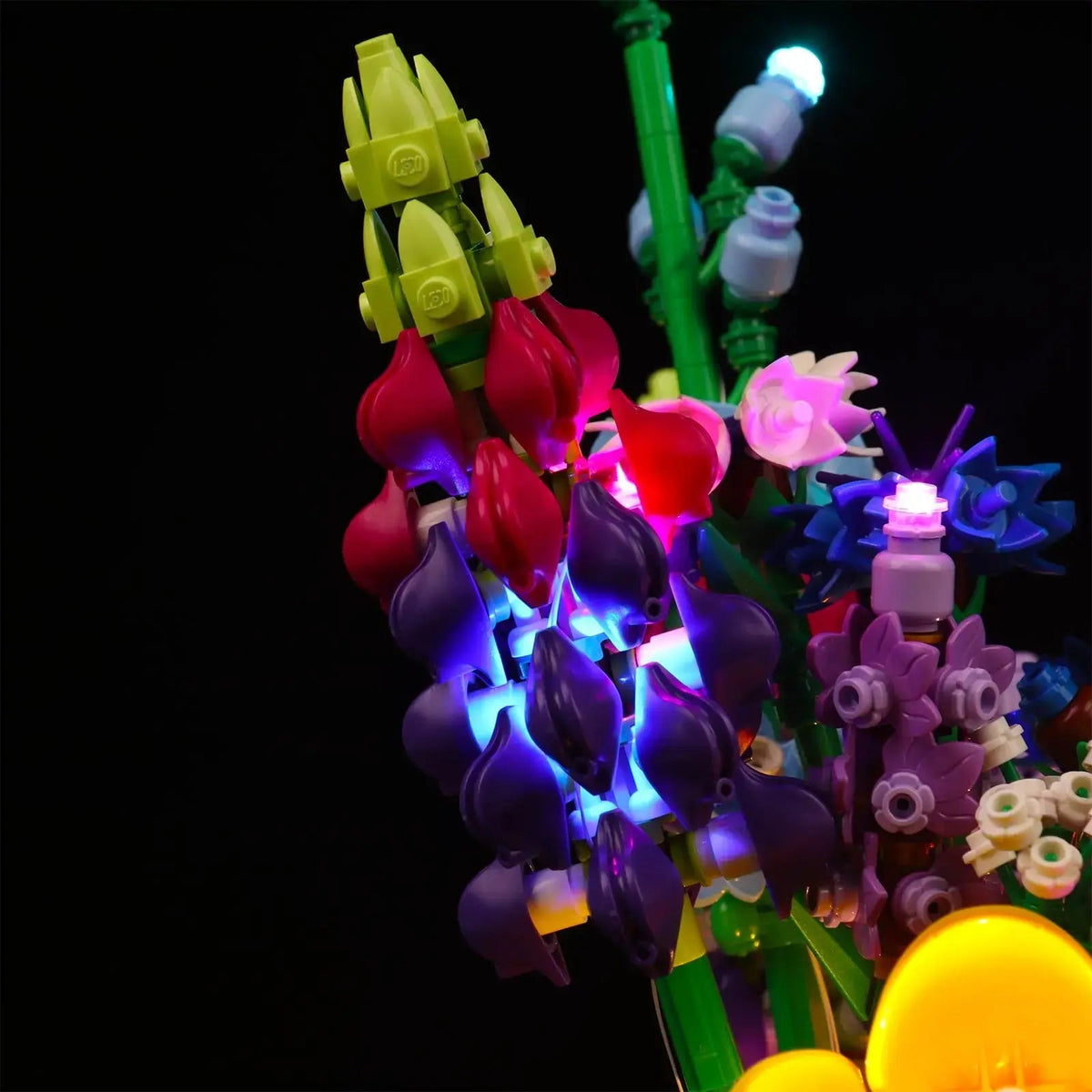 LEGO® Icons Wildflower Bouquet #10313 showcase lighting view, with the display light kit